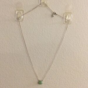 2/$15 Item 21 Necklace- gold tone 19 in fine chain with pale green pendant